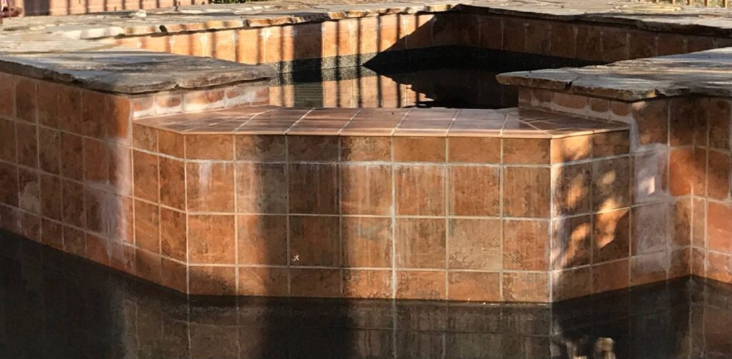 Spa tile scale removal before